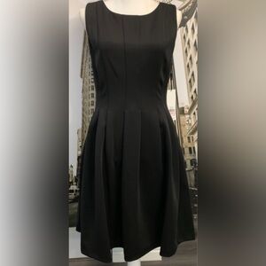 Calvin Klein Black Cocktail Dress. Worn only twice. Knee length dress.
